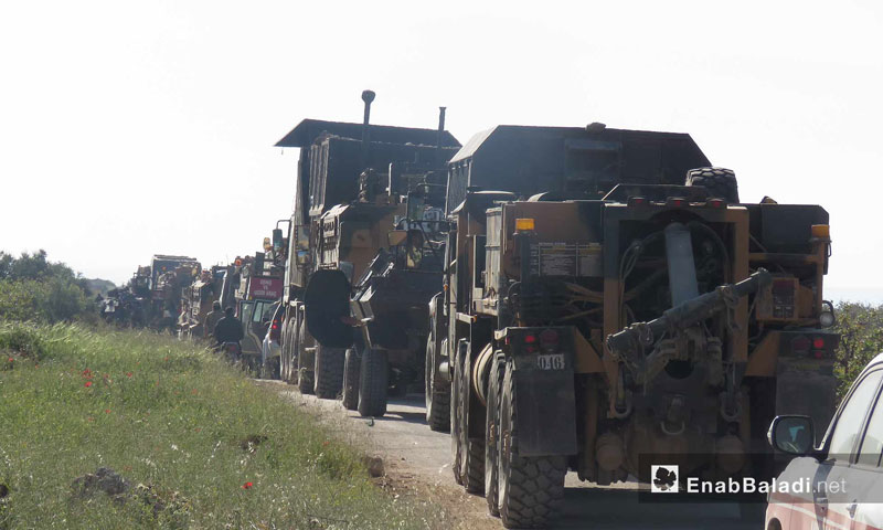 Heavy vehicles, within a Turkish convoy, enter rural Hama for the installation of the ninth supervision point – April 7, 2018 (Enab Baladi)