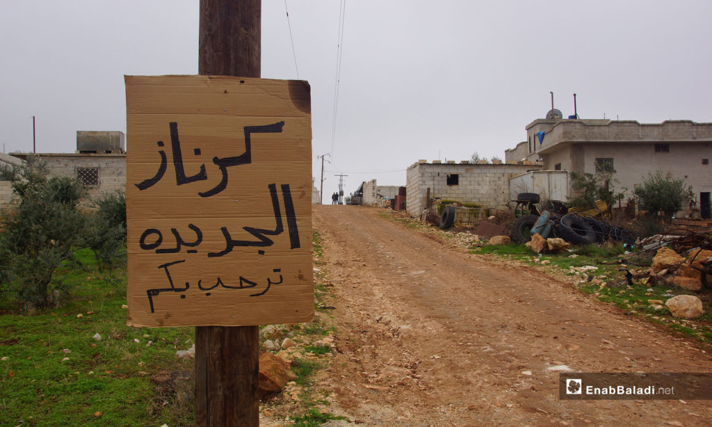 The people of rural Hama build a new village in rural Idlib, called “New Karnaz”- The sign says: Welcome to New Karnaz – December 18, 2018 (Enab Baladi)
