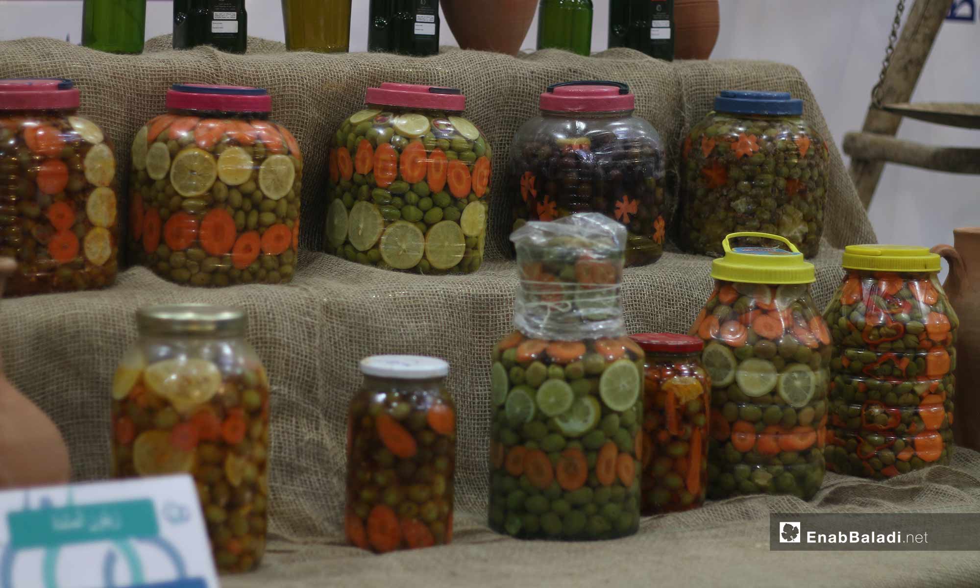 An exhibition for marketing olive products in the city of Armanaz in Idlib – December 15, 2018 (Enab Baladi)
