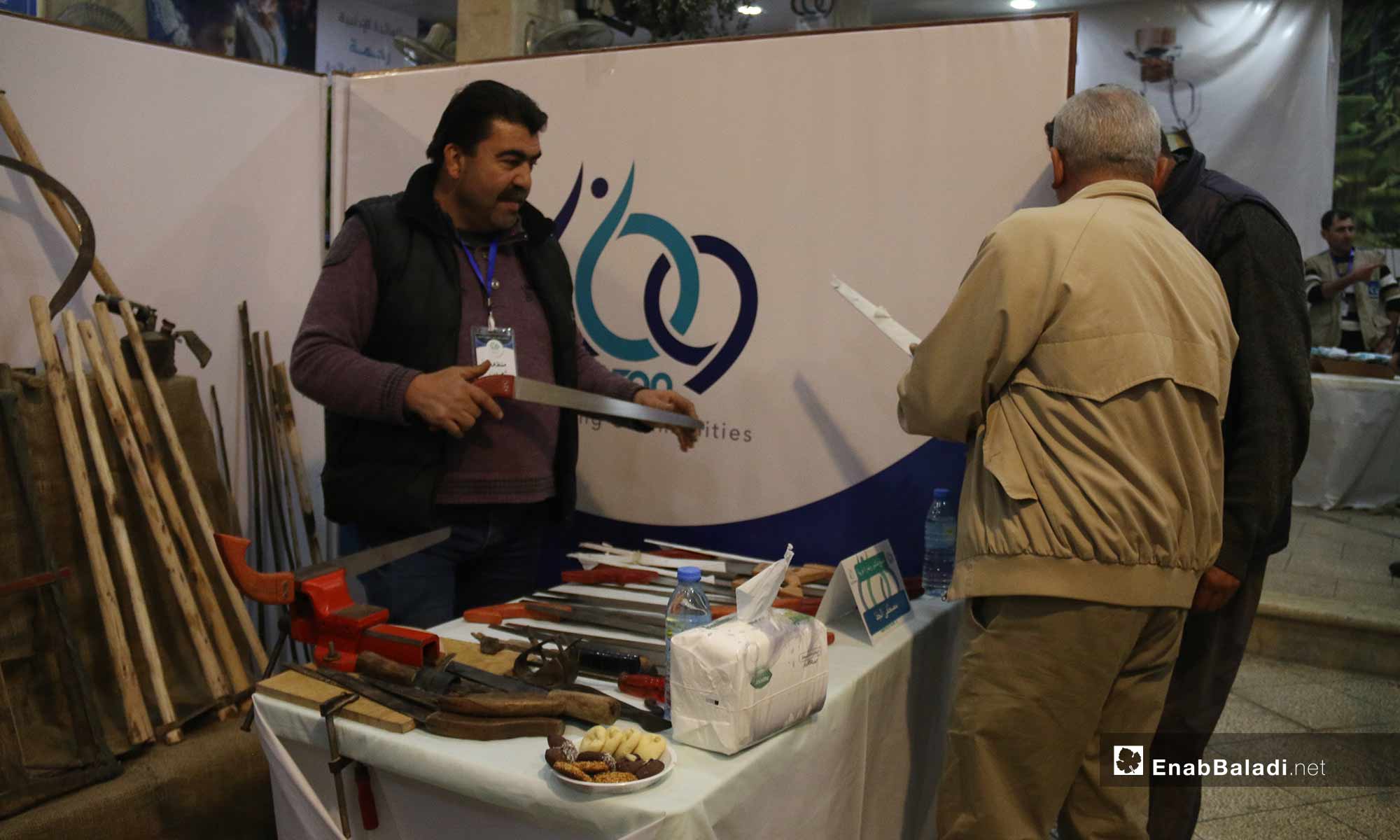 An exhibition for marketing olive products in the city of Armanaz in Idlib – December 15, 2018 (Enab Baladi)