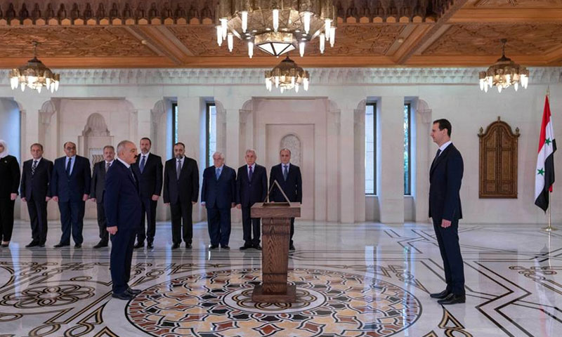 Interior Minister Maj. Gen. Mohammed Khaled Rahmoun taking oath before the President of the Syrian regime Bashar al-Assad / October 29, 2018 (SANA)