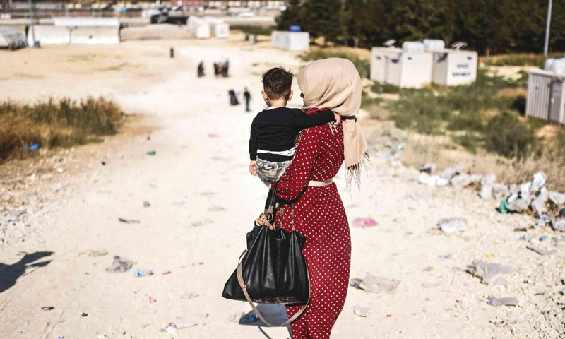 Syrian woman at the Turkish-Syrian borders – August 28, 2017 (AFP)                              