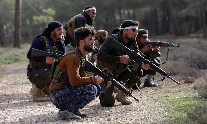 “Free Army” troops at a battle, north Afrin – March 6, 2018 (Reuters)