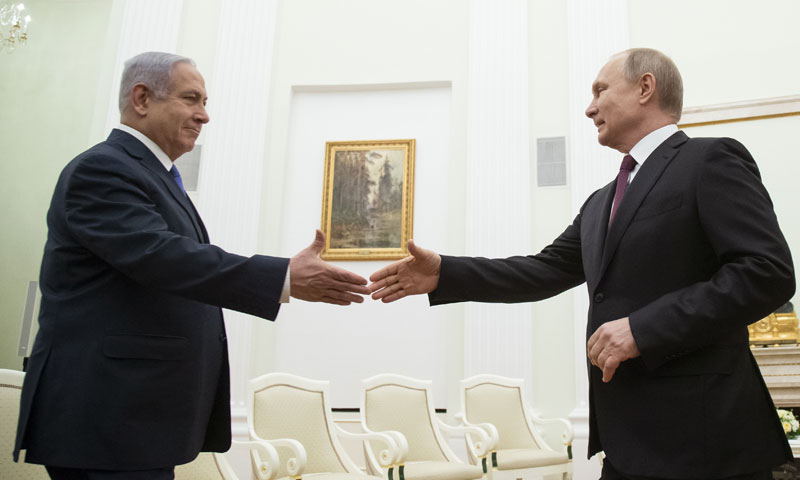 The Russian President Vladimir Putin shaking hands with the Israeli Prime Minister Benjamin Netanyahu on a meeting in the Kremlin – April 4, 2019 (Reuters)