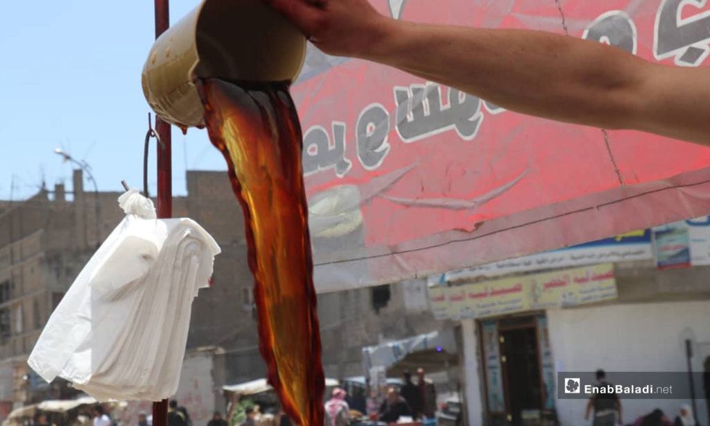 Licorice root drink prepared in Raqqa city’s markets on the first days of Ramadan – April 8, 2019 (Enab Baladi)