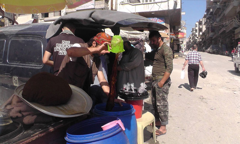 Liquorice vendor in the city of Salqin, Idlib – June 21, 2018 (Syria Graph)