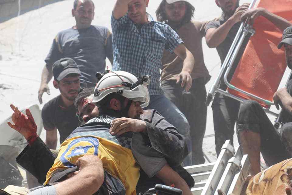 Elements of Syria Civil Defense trying to save civilians in Maarrat al-Nu'man following a raid of the regime’s military aviation - 26 May 2019 (Syria Civil Defense Facebook)