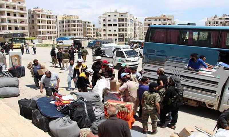 Displaced Palestinians from Yarmouk camp awaiting transfer to Hama - 2018 (Al-Arabi Al-Jadeed)