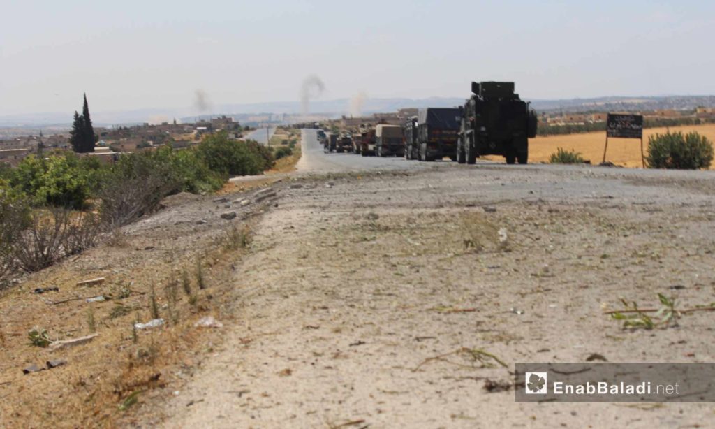 Turkish military convoy stuck near the Maer Hatat village, south of Ma`arat al-Nu`man in Idlib province, after being targeted by the Syrian regime’s forces – August 19, 2019 (Enab Baladi)
