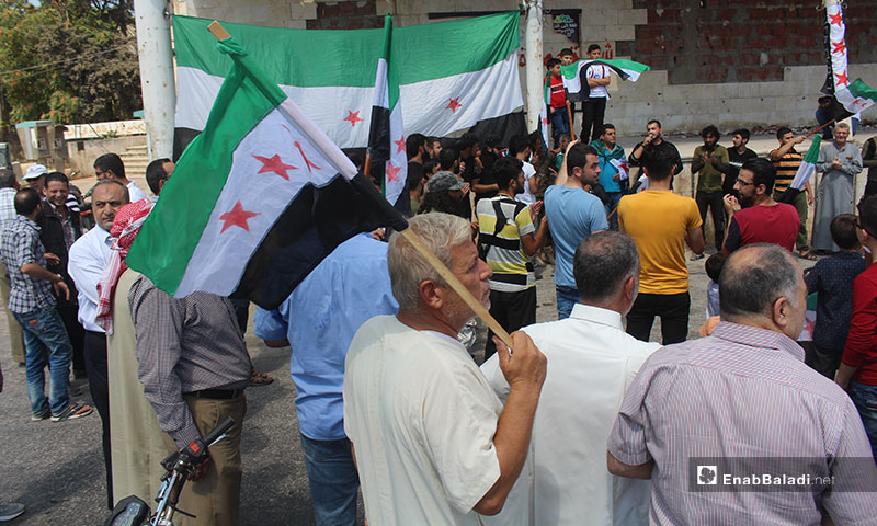 Demonstration in Idlib protesting the massacres committed against civilians – August 23, 2019 (Enab Baladi)