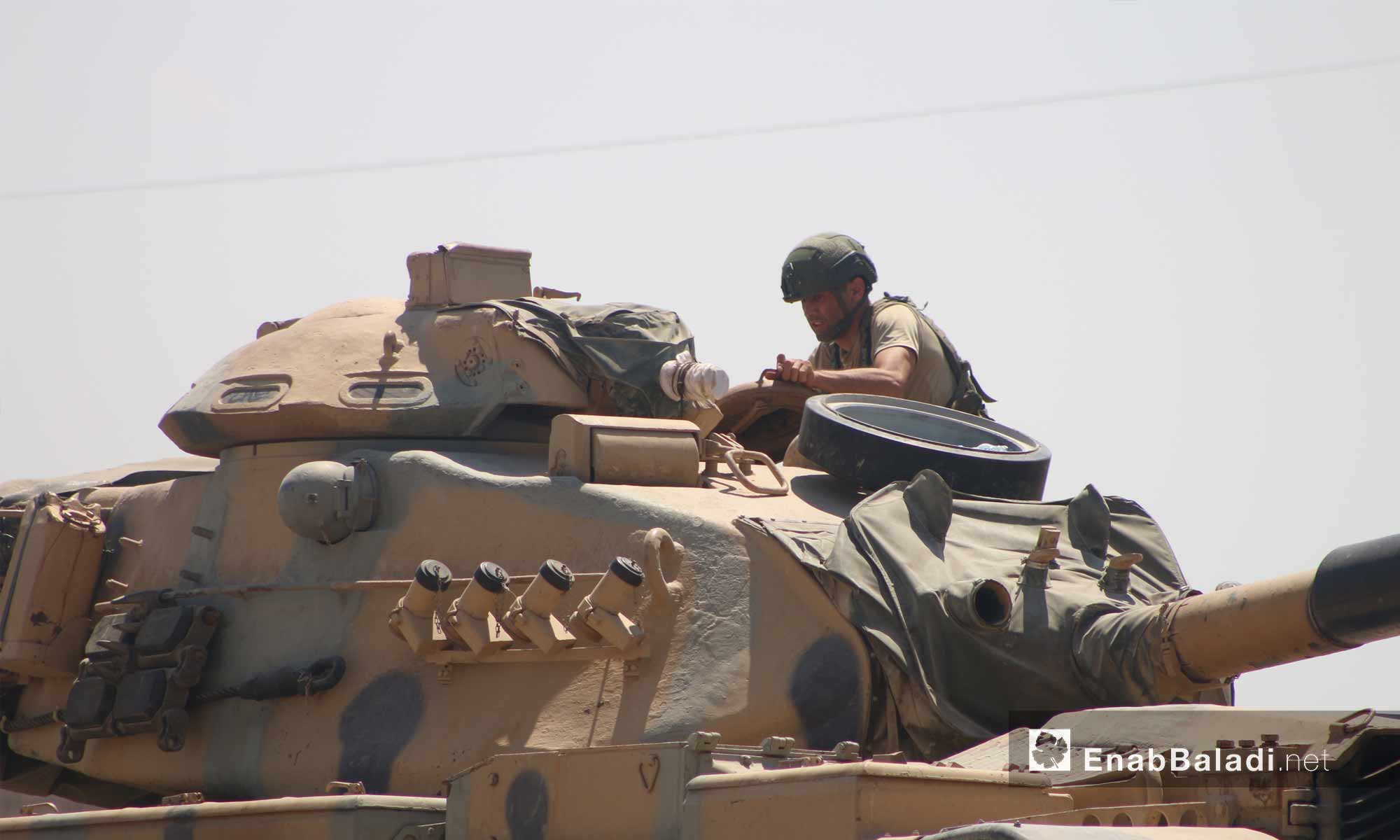 Turkish military convoy stuck near the Maer Hatat village, south of Ma`arat al-Nu`man in Idlib province, after being targeted by the Syrian regime’s forces – August 19, 2019 (Enab Baladi)