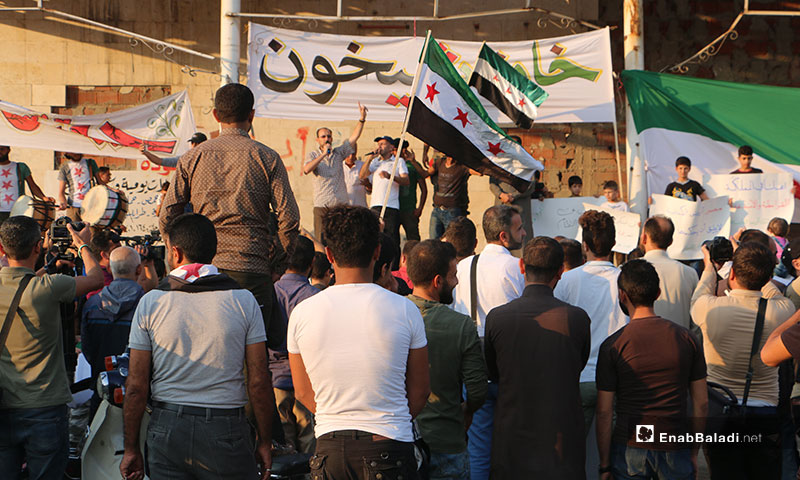 Demonstration held at the Clock Square in Idlib city, demanding the liberation of Khan Shaykhun and offsetting the Syrian regime – September 16, 2019 (Enab Baladi)