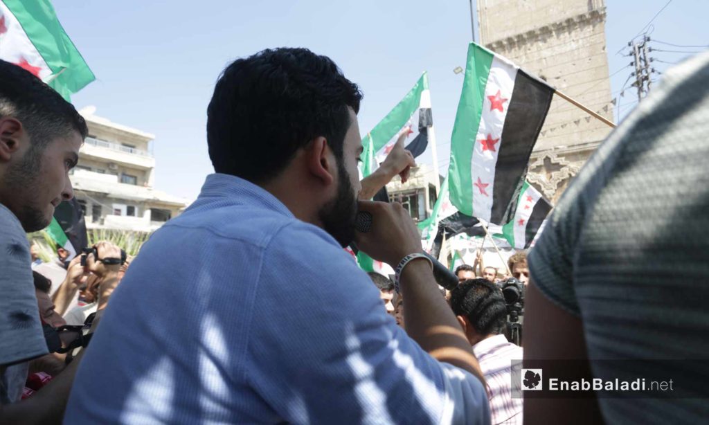 People in Ma`arat al-Nu`man, rural Idlib, protesting against the Sochi deal and demanding the ousting of the Syrian regime – September 6, 2019 (Enab Baladi)