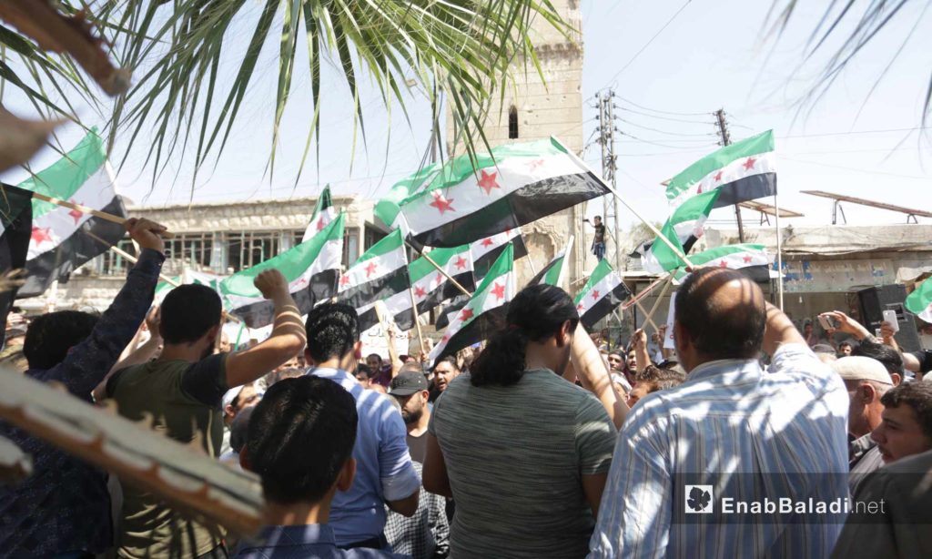 People in Ma`arat al-Nu`man, rural Idlib, protesting against the Sochi deal and demanding the ousting of the Syrian regime – September 6, 2019 (Enab Baladi)