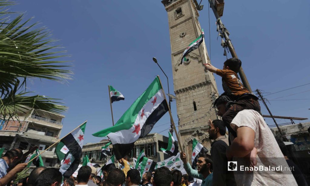 People in Ma`arat al-Nu`man, rural Idlib, protesting against the Sochi deal and demanding the ousting of the Syrian regime – September 6, 2019 (Enab Baladi)