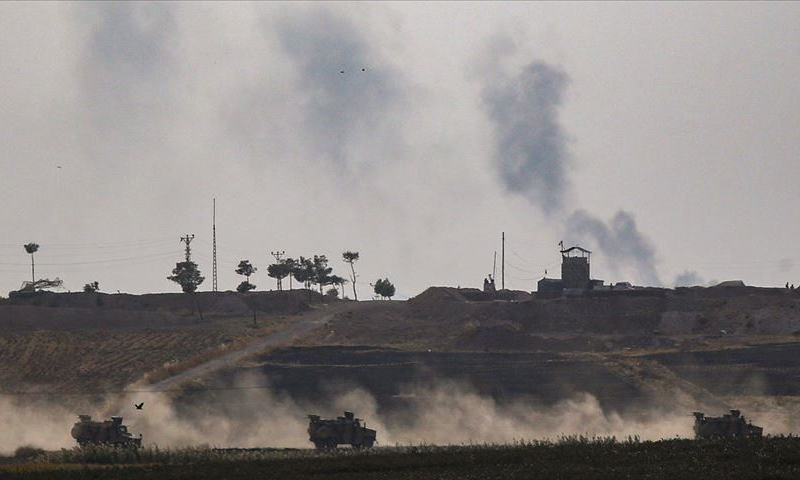 Turkish military vehicles on the border strip with Syria