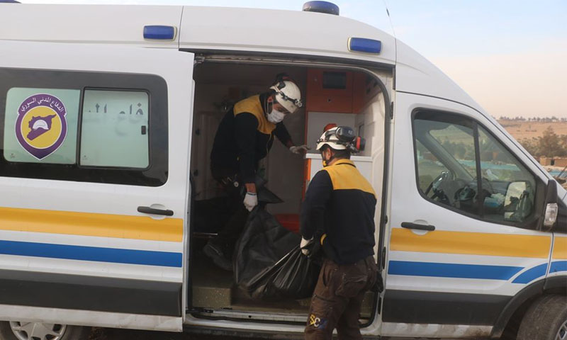 Syrian Civil Defense are picking up dead bodies in the village of Tarhin in eastern Aleppo - 26 November 2019 - (Syria’s Civil Defense Facebook page)