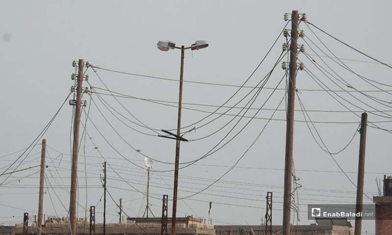 Electricity transmission towers in the northern countryside of Aleppo, April 2019 (Enab Baladi)