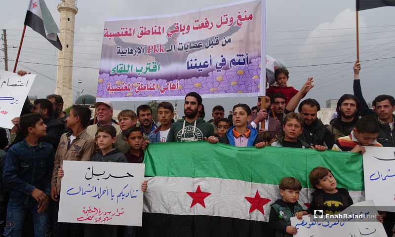 Residents of Tell Rifaat holding a demonstration in the Karaj Sajou Square, near the Bab al-Salam crossing in the northern province of Aleppo - 1 November 2019 (Enab Baladi)