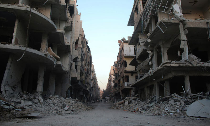 Buildings destroyed after shelling in the district of Harasta northeastern Damascus by Assad’s regime, 16 February 2018 (Ghouta Media Center)