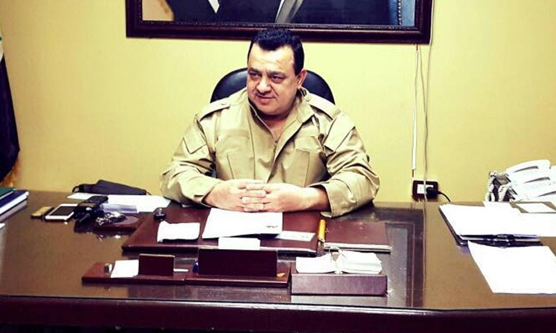 A photo for the leader of “Baath Commando” Jihad Barakat in his office (Source: Masaken Barzeh News Network)