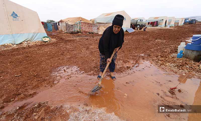 After rain hit Sinjar al-Kahraba camp, al-Jasem started her fight to remove the mud and puddles that gathered in her tent and the unpaved roads surrounding it.