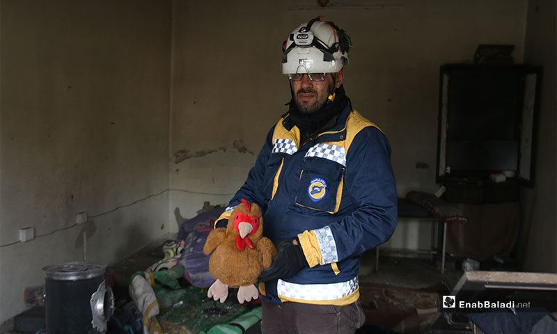 Syrian Civil Defence members inspect rubble at a site of Russian and regime bombing on the western countryside of Aleppo -  18 January 2020 (Enab Baladi)
