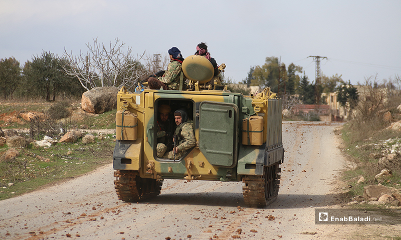 Fighters in the "National Liberation Front" during the preparations for a military attack in Idlib with the participation of Turkish soldiers ,10 February 2020 (Enab Baladi)