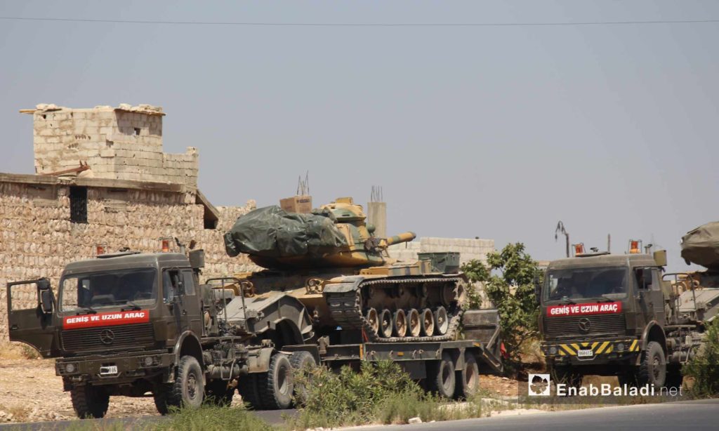 A Turkish military column stopping near Maar Hattat village to the south of Maarrat al-Numan in Idlib after being targeted by the Syrian regime forces. 19 August,2019 (Enab Baladi)