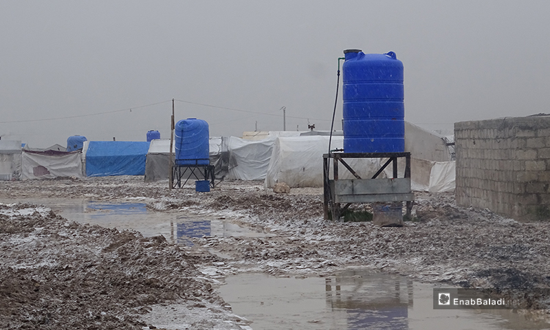 The residents of al-Marj camp face a brutal snowstorm in the town of Ehtemlat in the northern countryside of Aleppo - 12 Februray 2020 (Enab Baladi)
