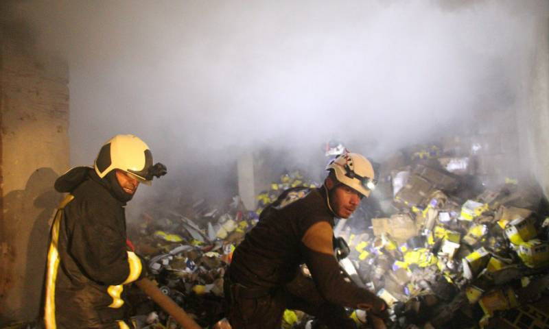 The Syrian Civil Defense firefighters teams putting out a fire caused by a car bomb in the city of Azaz, north of Aleppo - 19 March 2020 (the Syrian Civil Defense)