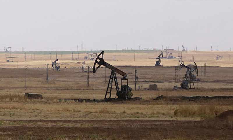 Oil well pumps in Rmelan oilfield in al-Hasakah province (AFP)