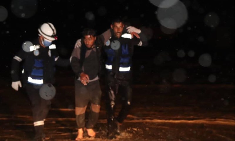 The emergency medical teams, affiliated to the Kurdish Autonomous Administration trying to rescue civilians in the southern countryside of Raqqa, who were washed away by the torrential floods triggered by the heavy rains - 27 March 2020 ( Raqqa Civil Council)