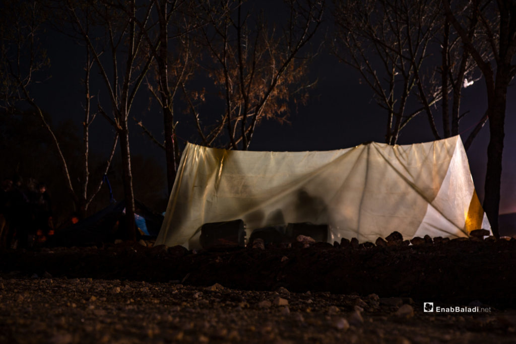 Migrants assemble on the Turkey-Greece border buffer zone near the Pazarkule crossing gate in Edirne, Turkey, hoping that Greece will open the border gate soon - 4 March 2020 (Enab Baladi)