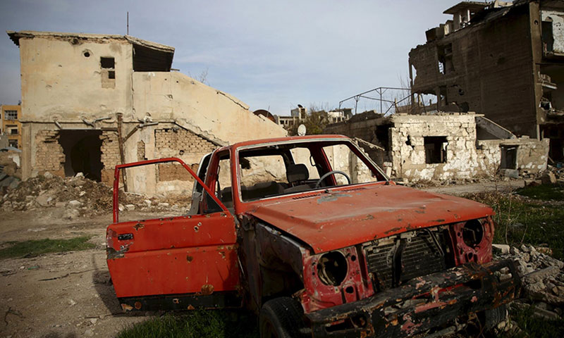 A destroyed vehicle in Jobar neighborhood in the Syrian capital, Damascus -25 May, 2016 (Reuters)