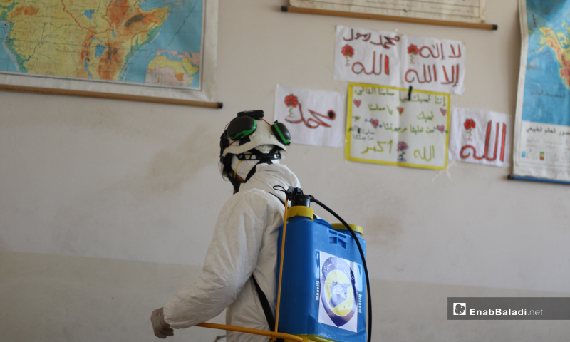 The Syrian civil defense teams carried out a disinfecting campaign for vital facilities in Akhtarin city north of Aleppo to prevent the spread of the novel coronavirus (Covid-19) – 24 March 2020 (Enab Baladi)