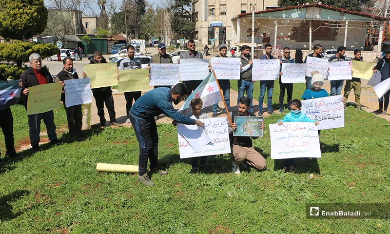 A vigil in Idlib city in memory of the third anniversary of the chemical massacre carried out by the Syrian regime in Khan Shaykhun town of rural Idlib – 04 April 2020 (Enab Baladi)