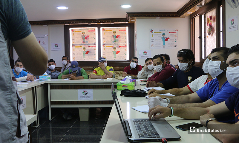Some of the attendees of the awareness workshop on the risks of the novel coronavirus (COVID-19) pandemic in Turkman Bareh town in northern Aleppo – 21 May 2020 (Enab Baladi - Abdul al-Salam Majaan)