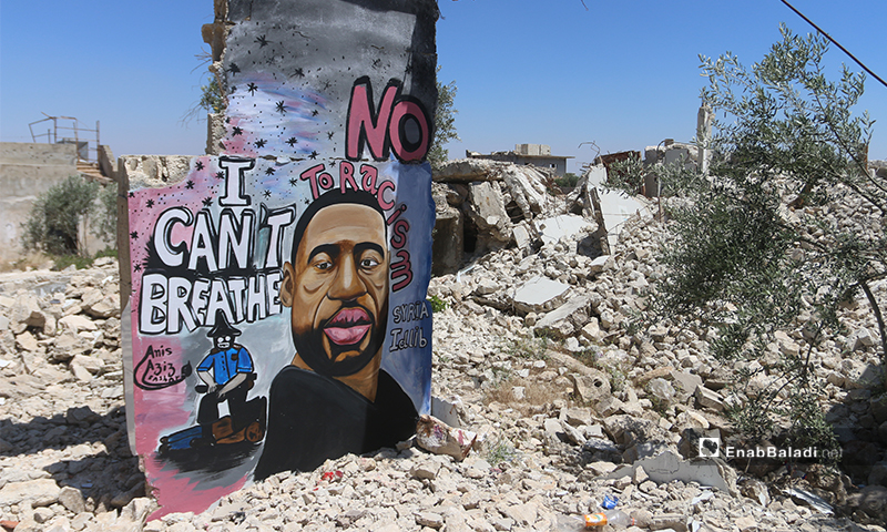 Al-Asmar condemned the discrimination against black people in the US through his mural in his hometown of Binnish in Idlib province - Yousef Ghuraibi – 01 June 2020