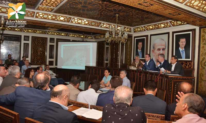 Members of Damascus Governorate Council gathered to announce the regulatory plan of al-Qaboun and the Yarmouk Camp areas - 25 June 2020 (Damascus governorate's Facebook account)