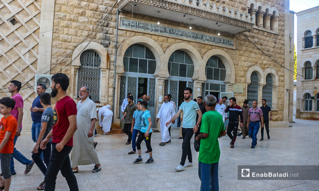 People exiting a mosque after the end of the Eid al-Adha prayer in Dabiq town in northern Aleppo countryside – 31 July 2020 (Enab Baladi / Abdul Salam Majan)