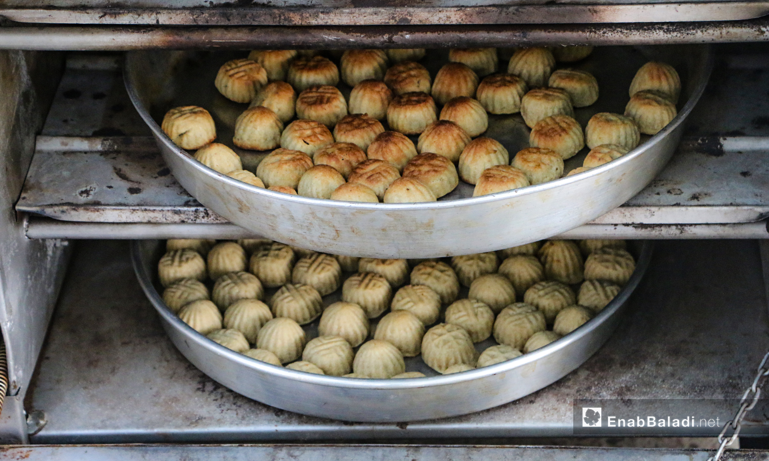 The preparation of home-made traditional Eid sweets in one of Dabiq townhouses in northern Aleppo countryside – 30 July 2020 (Enab Baladi / Abdul Salam Majan)