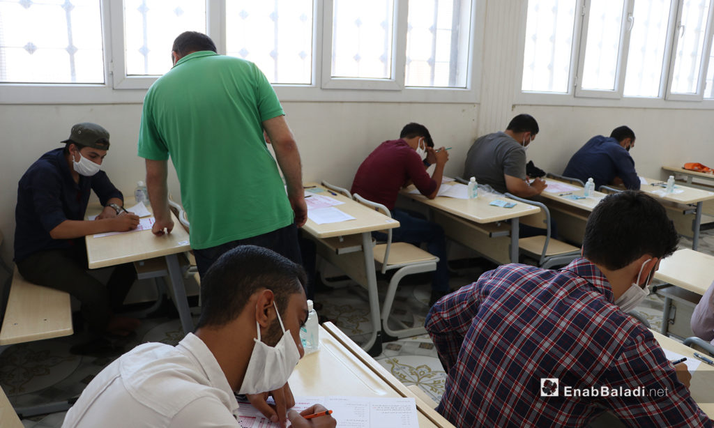 Students undergoing the final exams of the high school certificate amid the coronavirus (COVID-19) protective measures in al-Bab city of northern Aleppo countryside – 12 July 2020 (Enab Baladi / Asim Melhem)