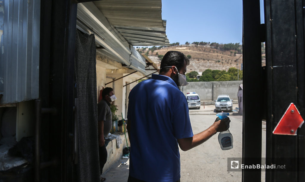 The medical staff of the "Bab al-Hawa" Hospital was preoccupied with sterilization to prevent the spread of the novel coronavirus (COVID-19) pandemic – 10 July 2020 (Enab Baladi / Yousef Ghuraibi)