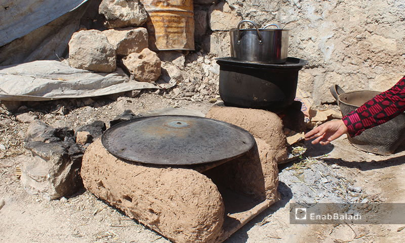 The traditional cooking of food in Arshin village on the al-Summaq Mountain of northern Idlib countryside – 17 June 2020 (Enab Baladi / Iyad Abdel Jawad)