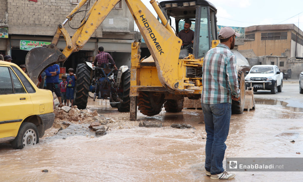 Workers performing the maintenance work for the water pipes system in al-Bab city in northern Aleppo countryside – 20 June 2020 (Enab Baladi / Asim Melhem)