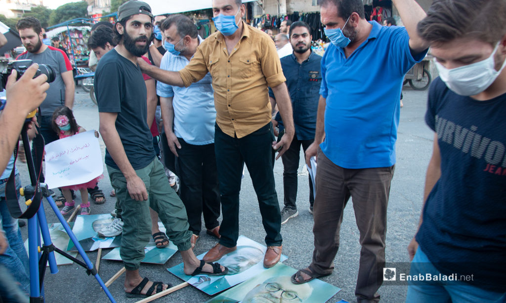 A protest stand in Idlib province against the National Coalition of Syrian Revolution and Opposition Forces and al-Assad’s gangs – 17 July 2020 (Enab Baladi / Anas al-Khouli)