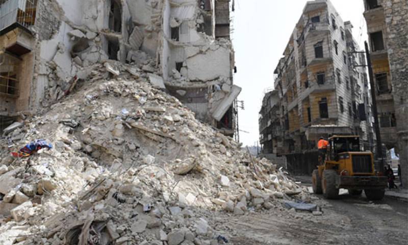 A rubble removal machinery in Homs city - 25 July 2020 (Al-Watan Online)