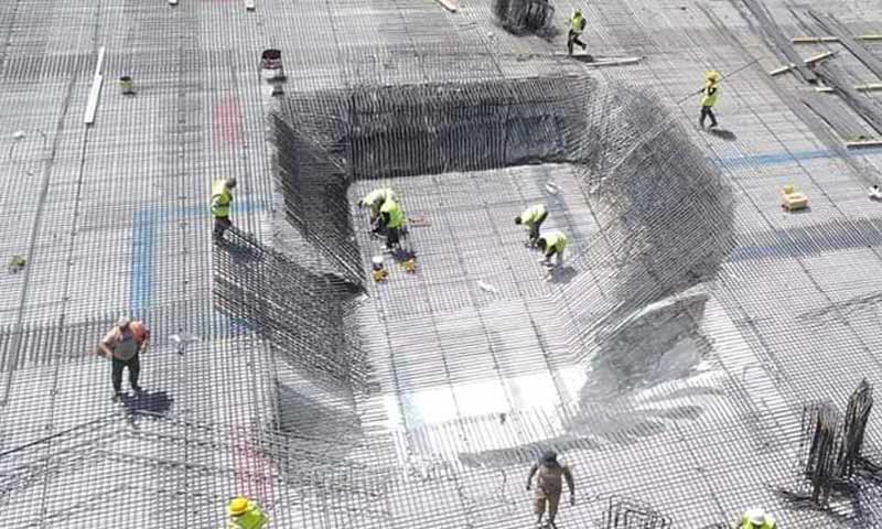 Construction workers at the site of "Marota City" project in Damascus (Marota City Facebook account)