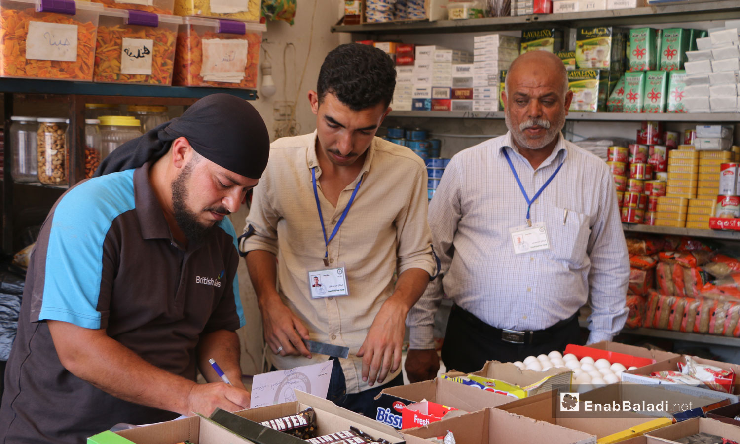 A consumer protection committee in Akhtarin city in Aleppo countryside during a tour to control the prices and monitor the foodstuffs expiry - 14 August 2020 (Enab Baladi / Abdul Salam Majan)